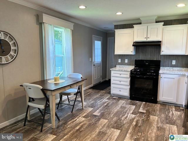 8220 Airport Road Bath, PA 18014 - Photo 15 of 25 a kitchen with stainless steel appliances granite countertop a stove a refrigerator a sink a dining table and chairs with wooden floor