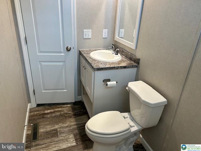 8220 Airport Road Bath, PA 18014 - Photo 19 of 25 a bathroom with a toilet sink and mirror