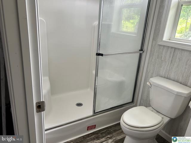 8220 Airport Road Bath, PA 18014 - Photo 23 of 25 a white toilet sitting next to a shower