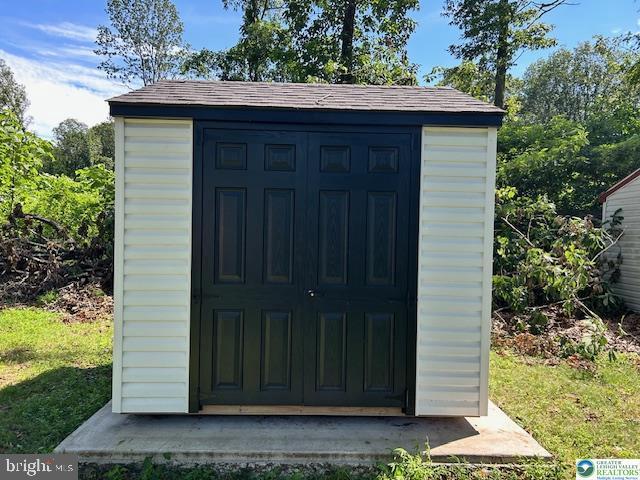 8220 Airport Road Bath, PA 18014 - Photo 25 of 25 a couple of potted plants in front of door