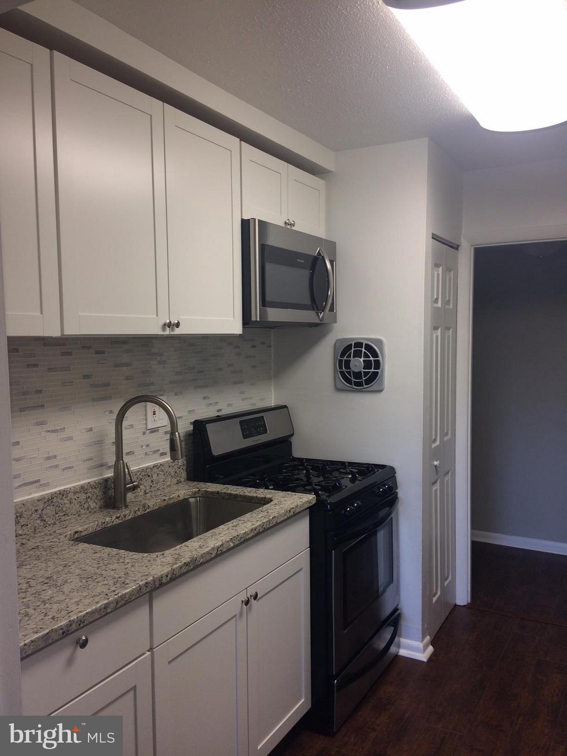 3811 St Barnabas Road, Unit T1 Suitland, MD 20746 - Photo 2 of 15 kitchen