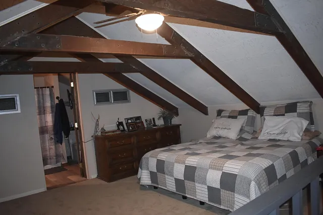 a bathroom with double vanity sinks a vanity and a mirror
