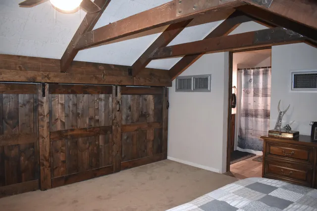 a view of a hallway with washer and dryer
