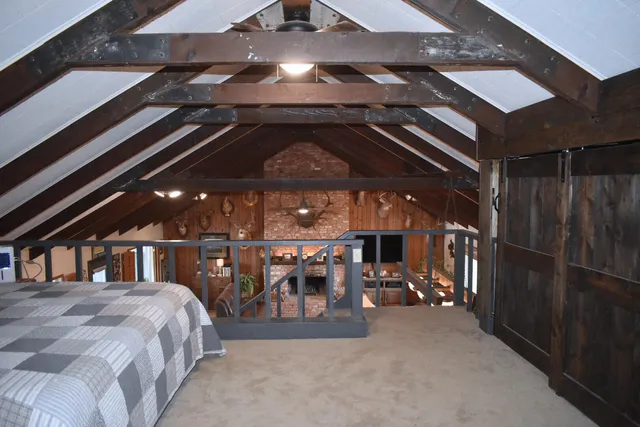 a bedroom with a bed and furniture