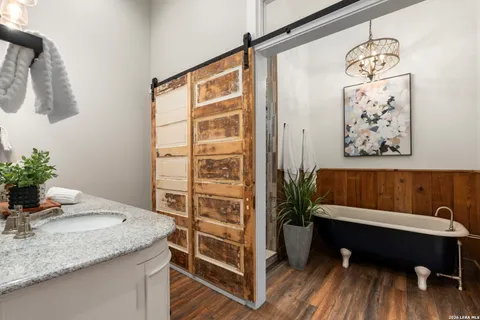 a room with a table and a potted plant
