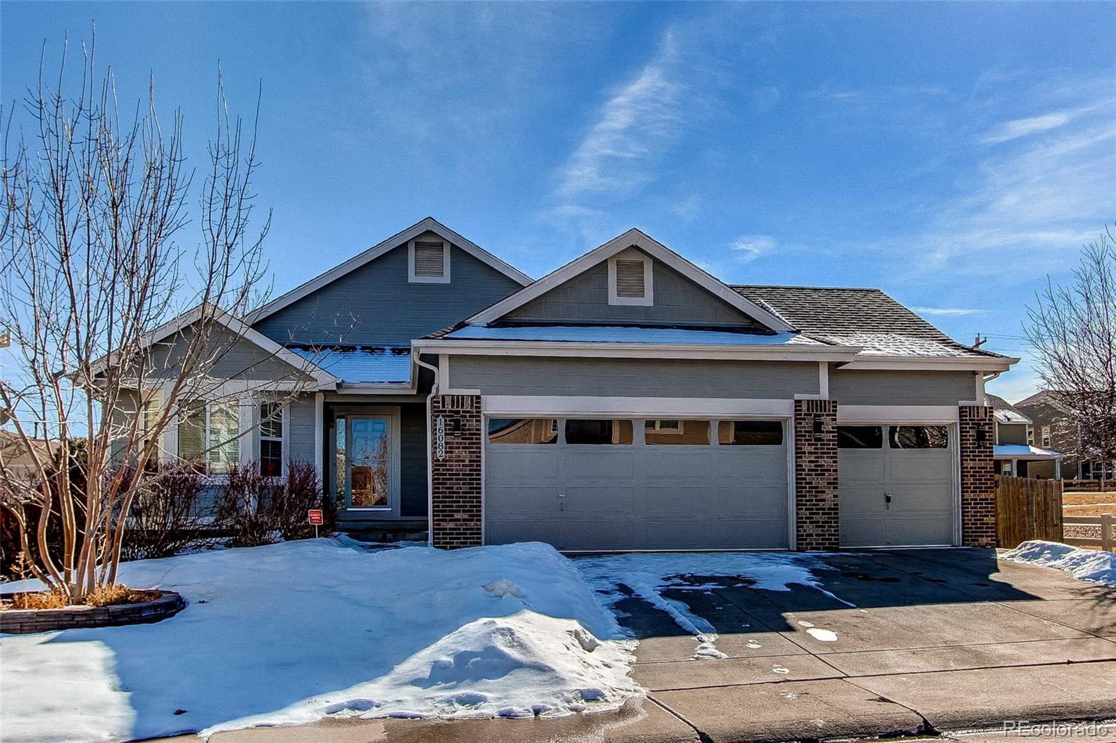 16082 Butterwort Circle Parker, CO 80134 - Photo 1 of 39 a front view of a house with a yard