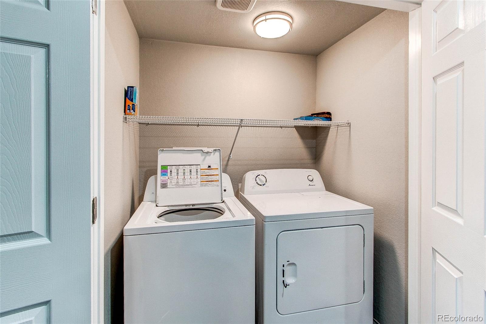 16082 Butterwort Circle Parker, CO 80134 - Photo 27 of 39 a utility room with dryer and washer