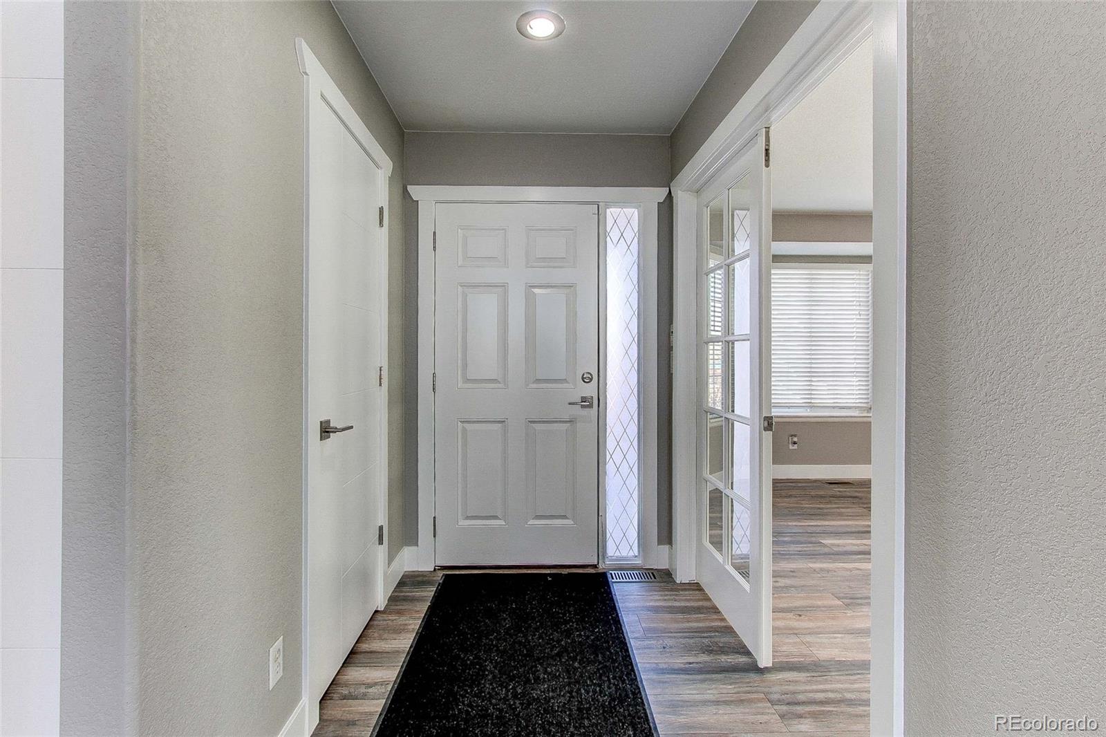 16082 Butterwort Circle Parker, CO 80134 - Photo 3 of 39 a view of a hallway