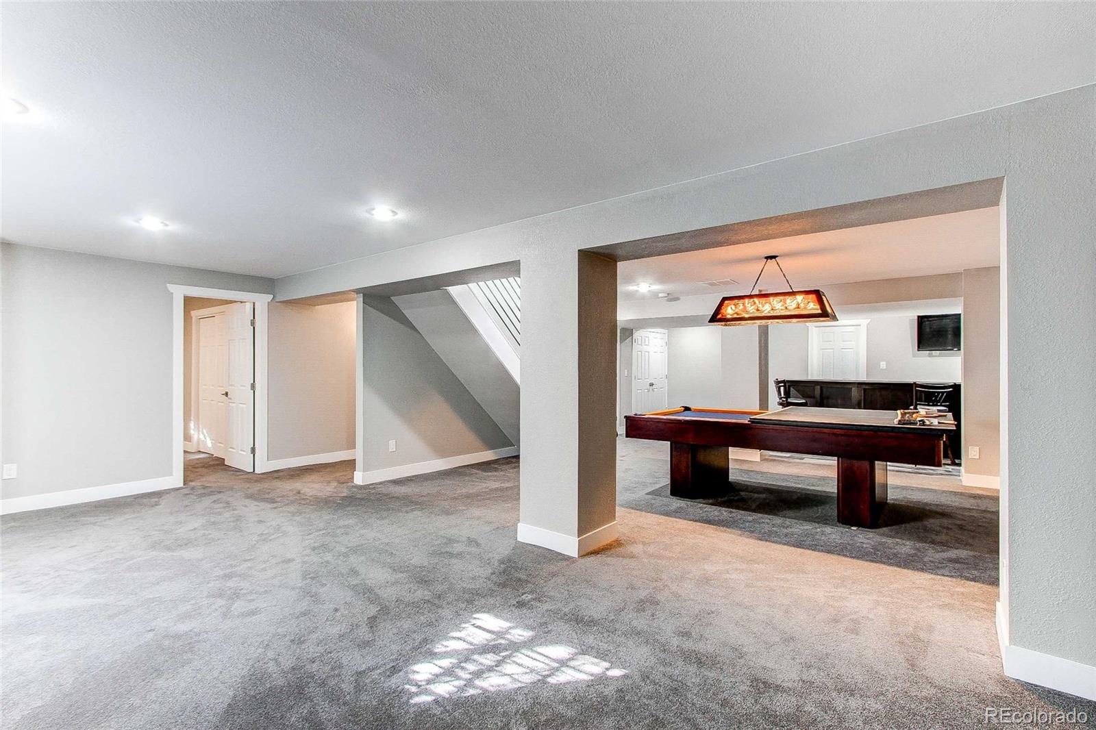 16082 Butterwort Circle Parker, CO 80134 - Photo 32 of 39 a lobby with furniture and window