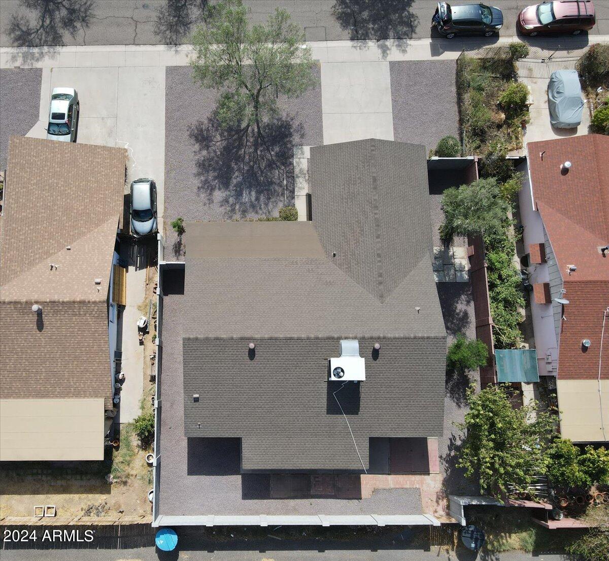 2732 East Cactus Road Phoenix, AZ 85032 - Photo 28 of 30 an aerial view of residential houses with outdoor space