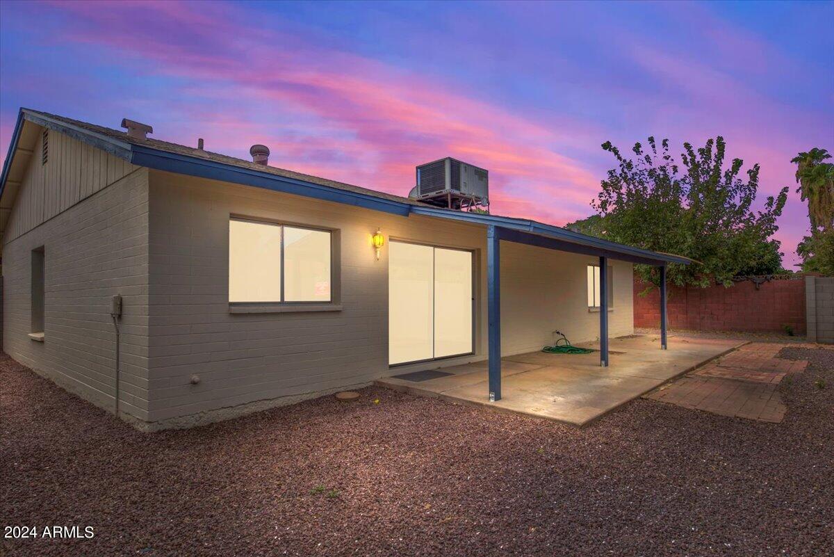 2732 East Cactus Road Phoenix, AZ 85032 - Photo 7 of 30 a front view of a house with a yard