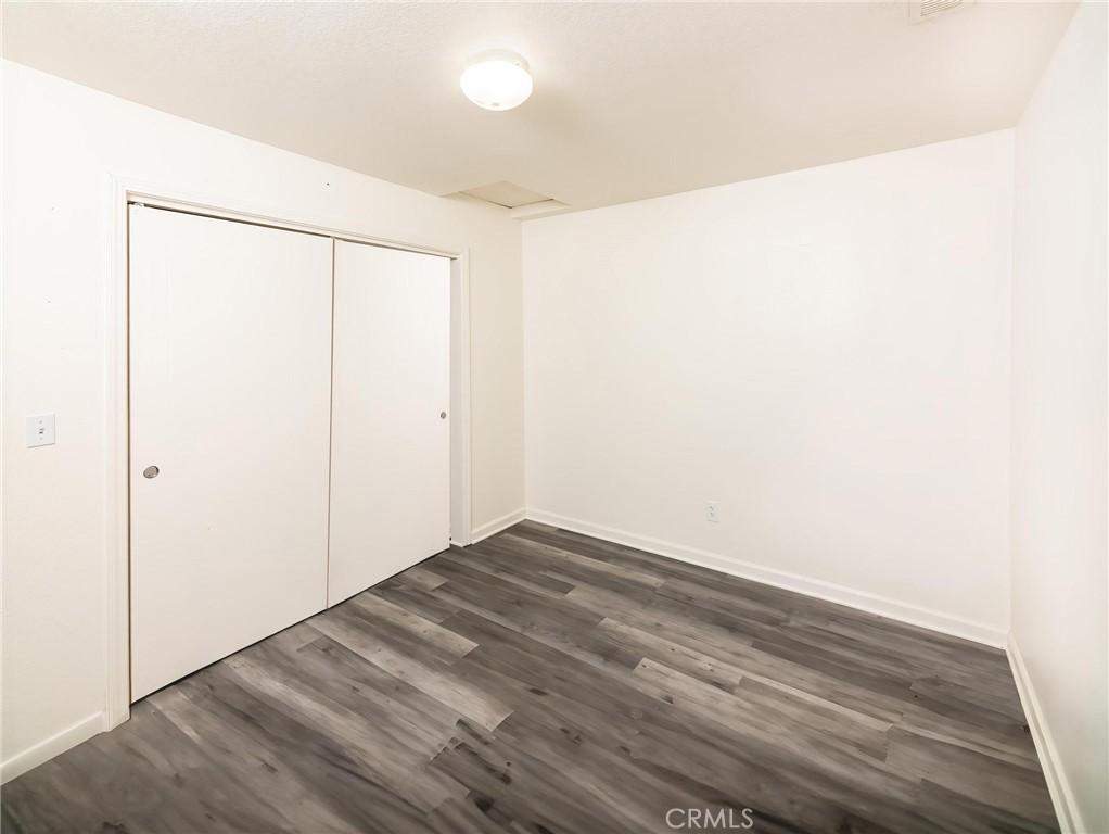 4571 State Highway 20 Nice, CA 95464 - Photo 11 of 24 a view of empty room with wooden floor