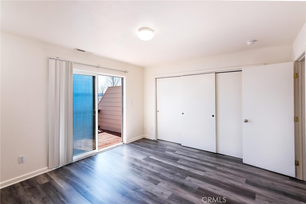 4571 State Highway 20 Nice, CA 95464 - Photo 17 of 24 a view of an empty room with wooden floor