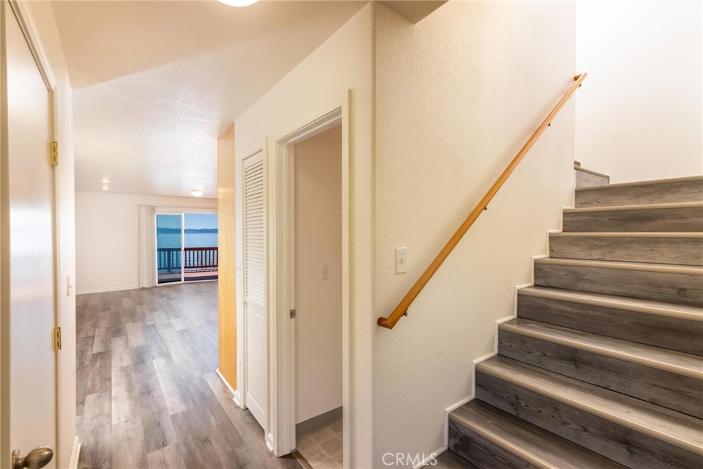 4571 State Highway 20 Nice, CA 95464 - Photo 4 of 24 a view of an entryway with wooden floor and stairs