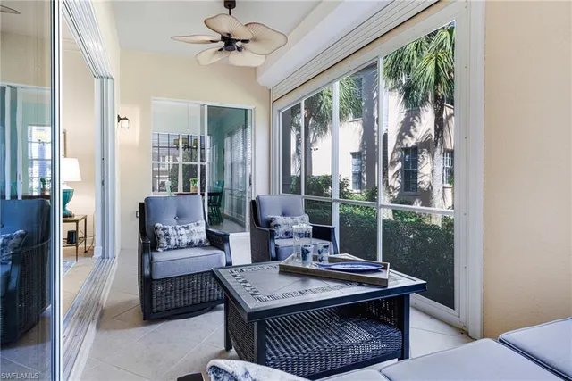 a view of a livingroom with furniture and window