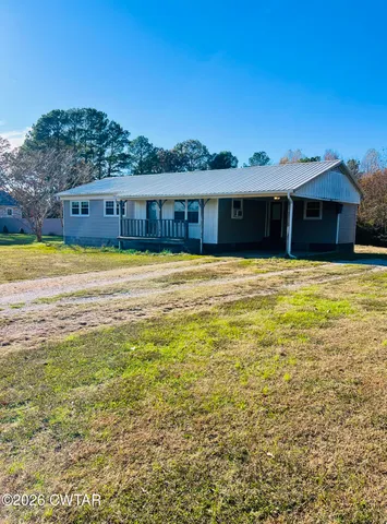 a view of a house with a swimming pool