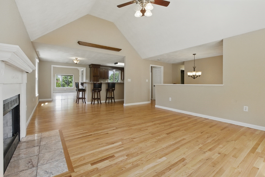 25 Sandra Road Peabody, MA 01960 - Photo 19 of 41 an empty room with wooden floor and dining room view
