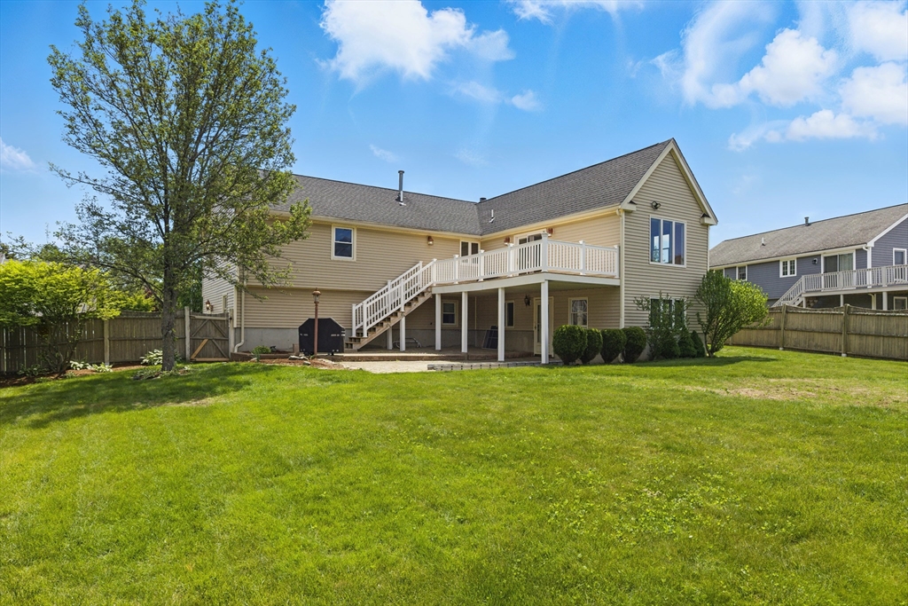 25 Sandra Road Peabody, MA 01960 - Photo 40 of 41 a front view of house with yard and green space