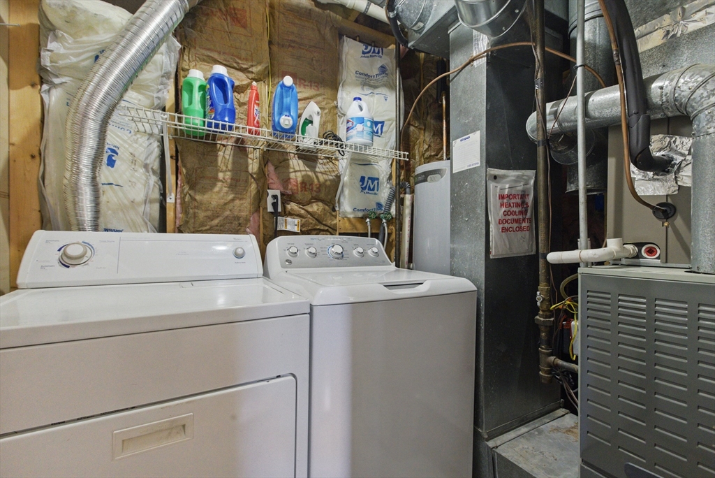 25 Sandra Road Peabody, MA 01960 - Photo 10 of 41 a utility room with dryer and washer