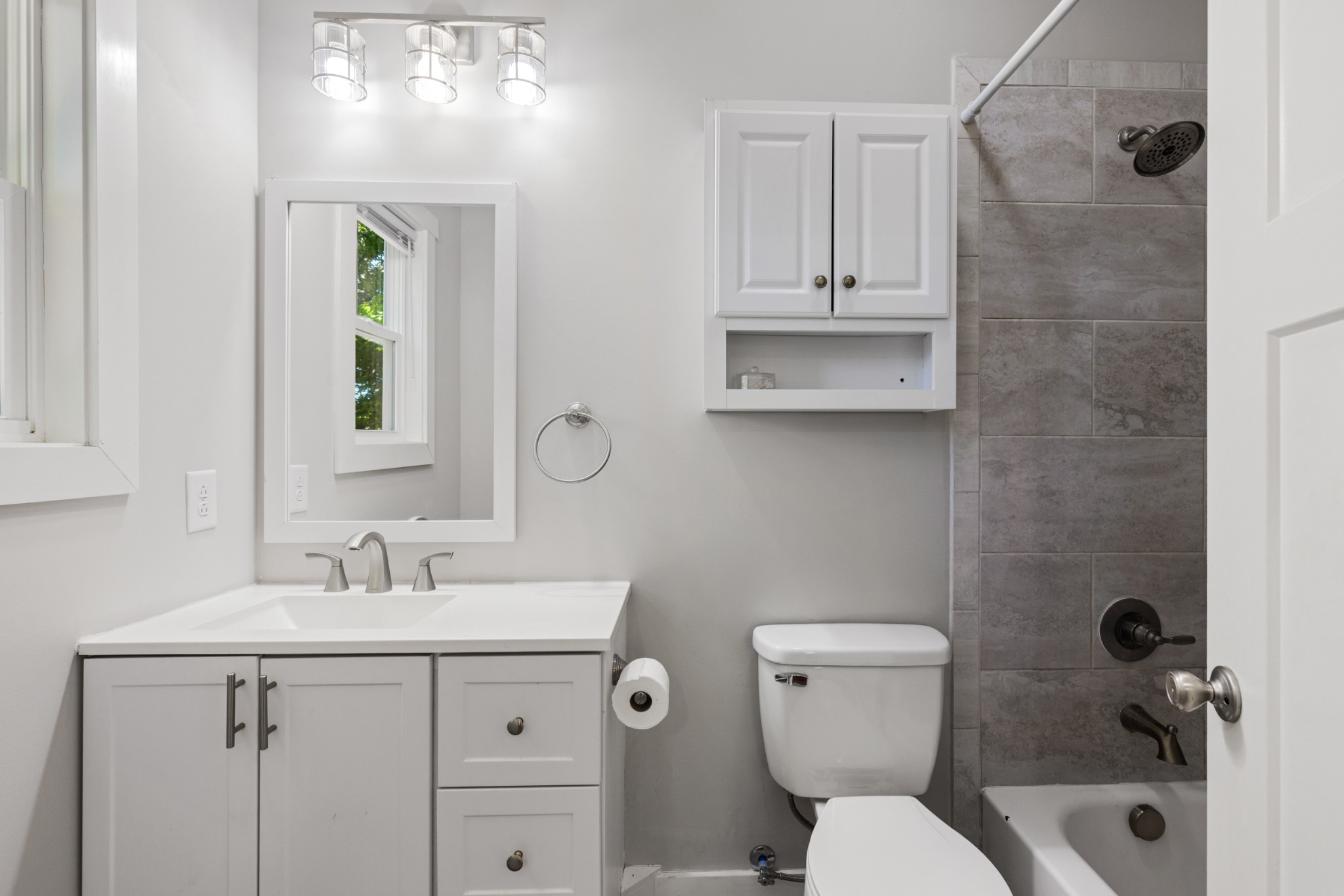 115 North Adams Street Adams, TN 37010 - Photo 25 of 44 a bathroom with a toilet a sink and mirror