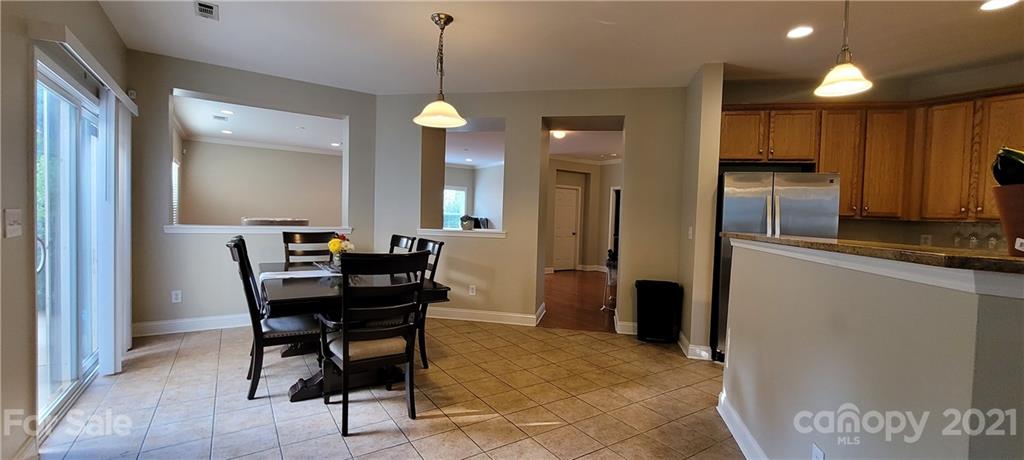 9611 Seamill Road Charlotte, NC 28278 - Photo 7 of 26 a view of a dining room with furniture