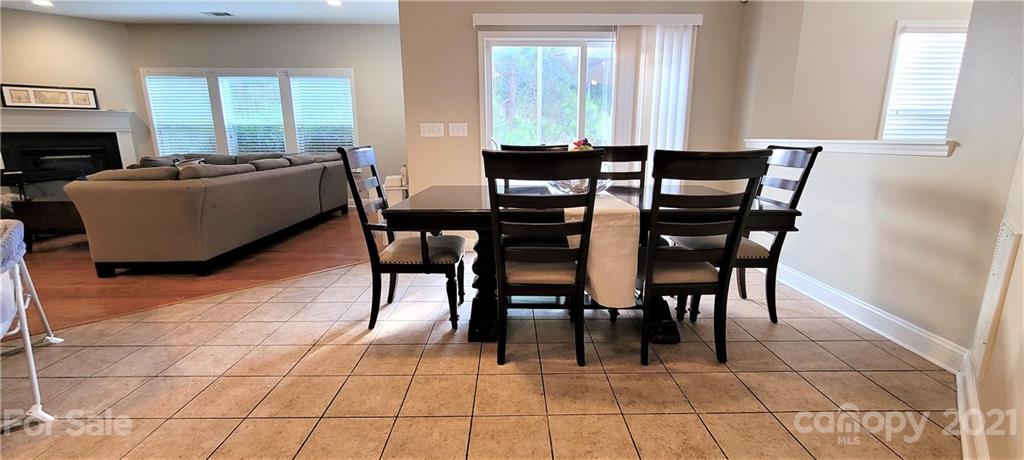 9611 Seamill Road Charlotte, NC 28278 - Photo 8 of 26 a dining room with furniture and window