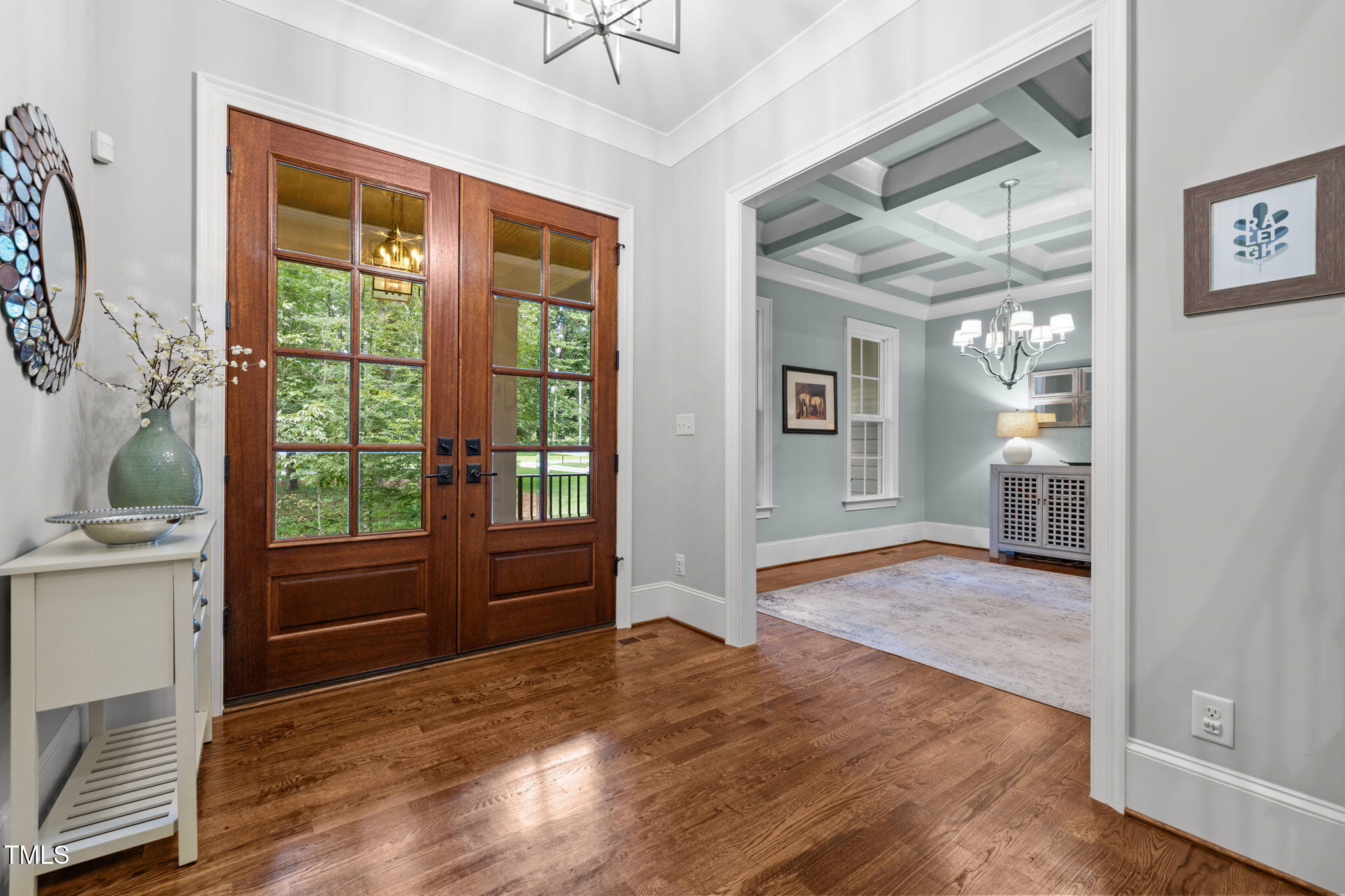 3005 Club Drive Raleigh, NC 27613 - Photo 3 of 45 a view of empty room with wooden floor and fan