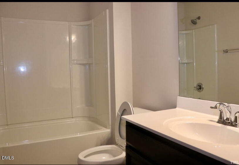 224 Hopewell Lane Wake Forest, NC 27587 - Photo 11 of 17 a bathroom with a sink toilet and shower