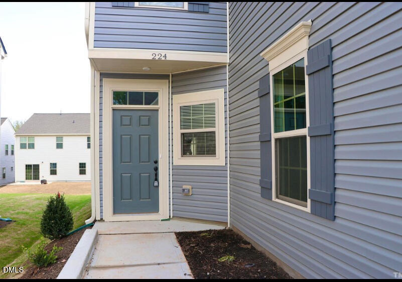 224 Hopewell Lane Wake Forest, NC 27587 - Photo 2 of 17 a view of a house with a door and a rug