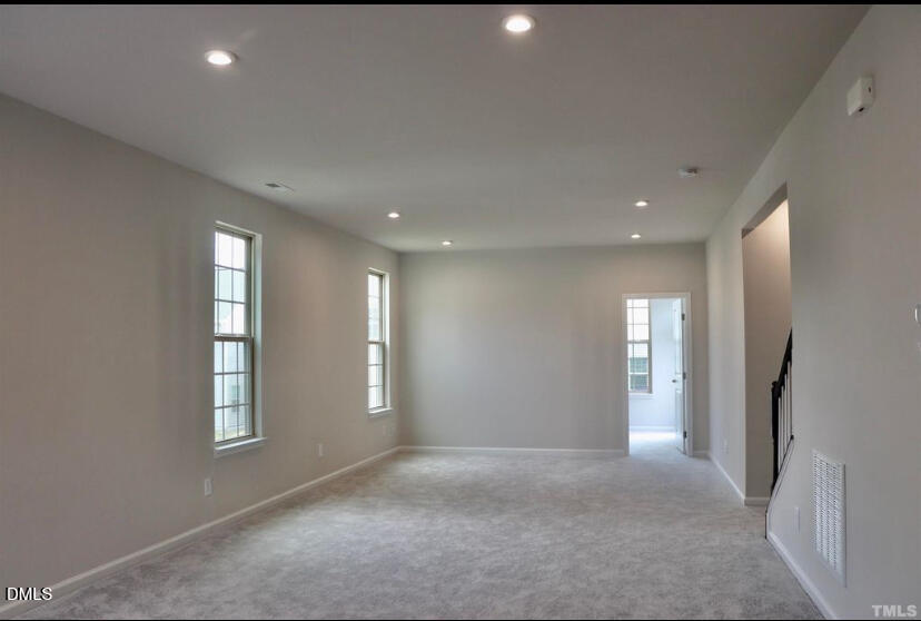224 Hopewell Lane Wake Forest, NC 27587 - Photo 8 of 17 a view of livingroom with windows