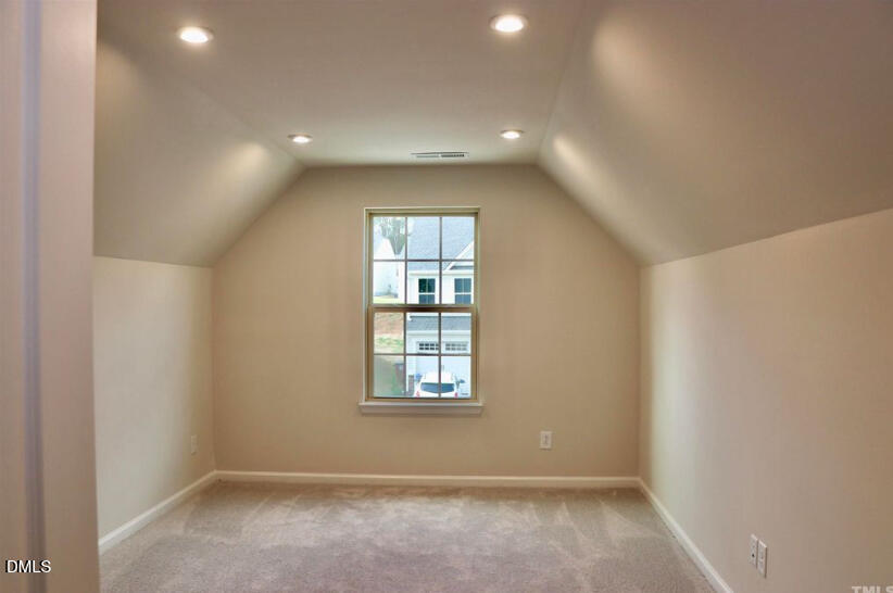 224 Hopewell Lane Wake Forest, NC 27587 - Photo 9 of 17 an empty room with windows