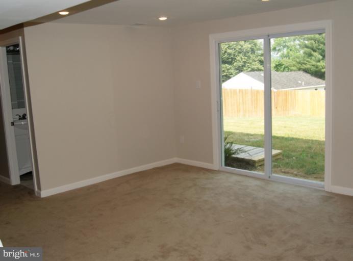 2302 Kingsway Road Fort Washington, MD 20744 - Photo 13 of 30 an empty room with windows