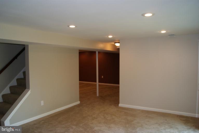 2302 Kingsway Road Fort Washington, MD 20744 - Photo 19 of 30 an empty room with wooden floor and closet