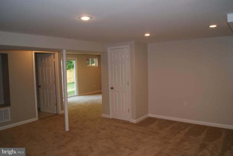 2302 Kingsway Road Fort Washington, MD 20744 - Photo 21 of 30 an empty room with windows and closet