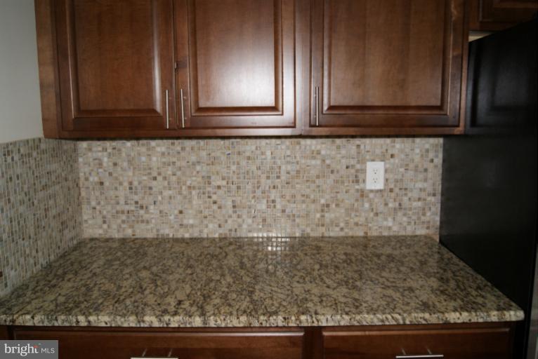 2302 Kingsway Road Fort Washington, MD 20744 - Photo 10 of 30 a view of kitchen with granite countertop cabinets