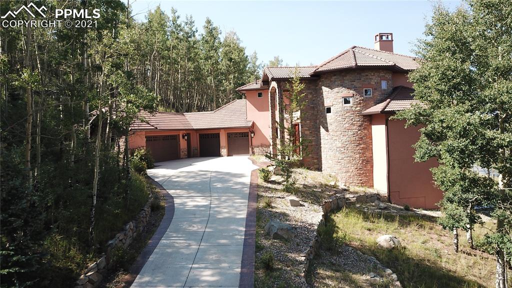 2017 County Road 1 Road Cripple Creek, CO 80813 - Photo 4 of 42 a front view of house with yard