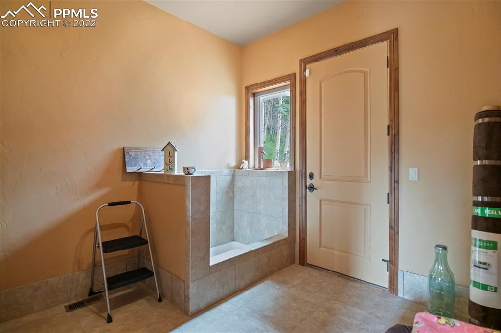 2017 County Road 1 Road Cripple Creek, CO 80813 - Photo 42 of 42 a view of a livingroom with an empty space and a window