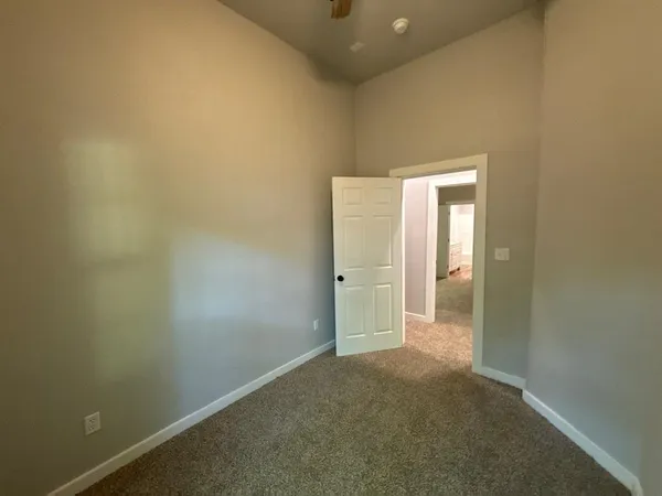 a bedroom with a bed and furniture