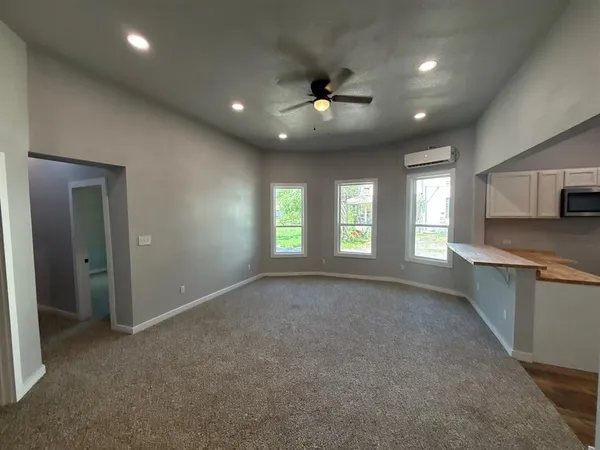 a kitchen with a sink stainless steel appliances and cabinets
