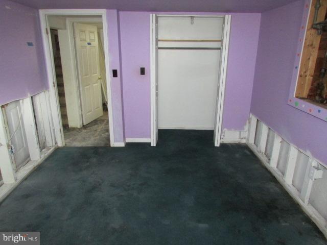 4116 Sampson Road Silver Spring, MD 20906 - Photo 16 of 22 a view of a hallway with brick walls