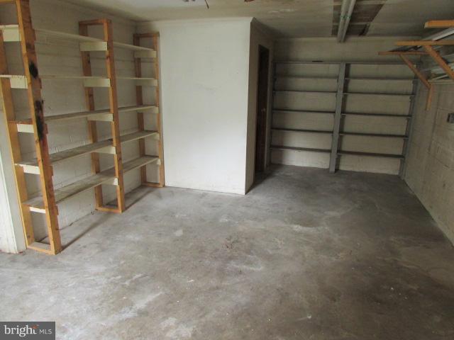 4116 Sampson Road Silver Spring, MD 20906 - Photo 18 of 22 a view of an empty room with empty shelves