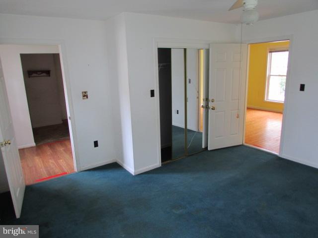4116 Sampson Road Silver Spring, MD 20906 - Photo 9 of 22 an empty room with windows