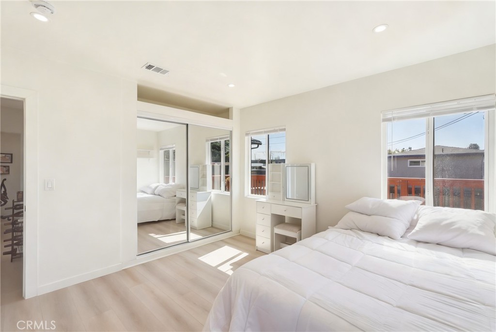 910 Arwin Street Pasadena, CA 91001 - Photo 11 of 23 a bedroom with a bed and a large window