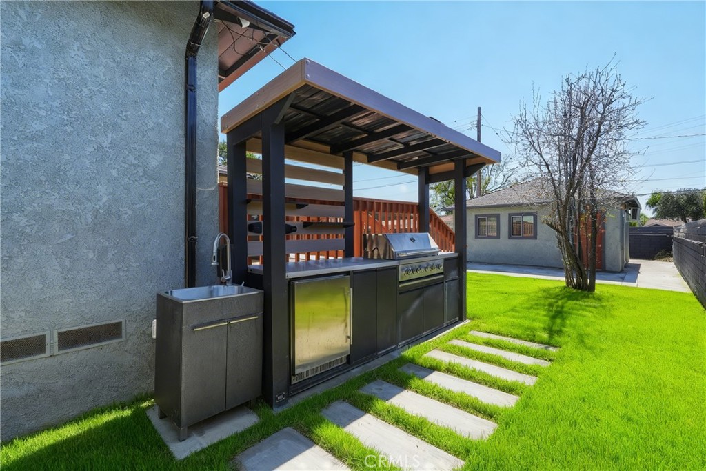 910 Arwin Street Pasadena, CA 91001 - Photo 19 of 23 a view of a house with a backyard