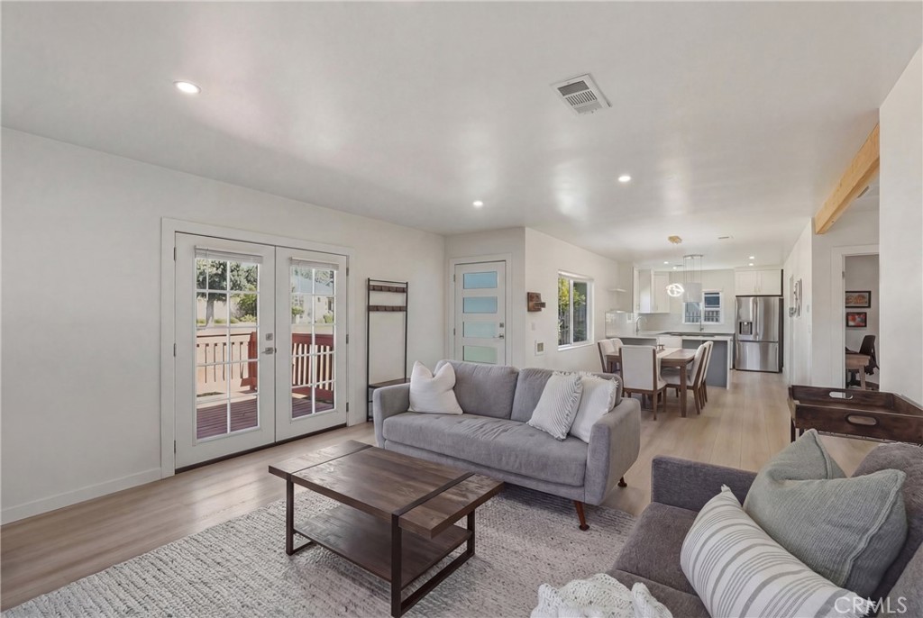 910 Arwin Street Pasadena, CA 91001 - Photo 2 of 23 a living room with furniture and wooden floor