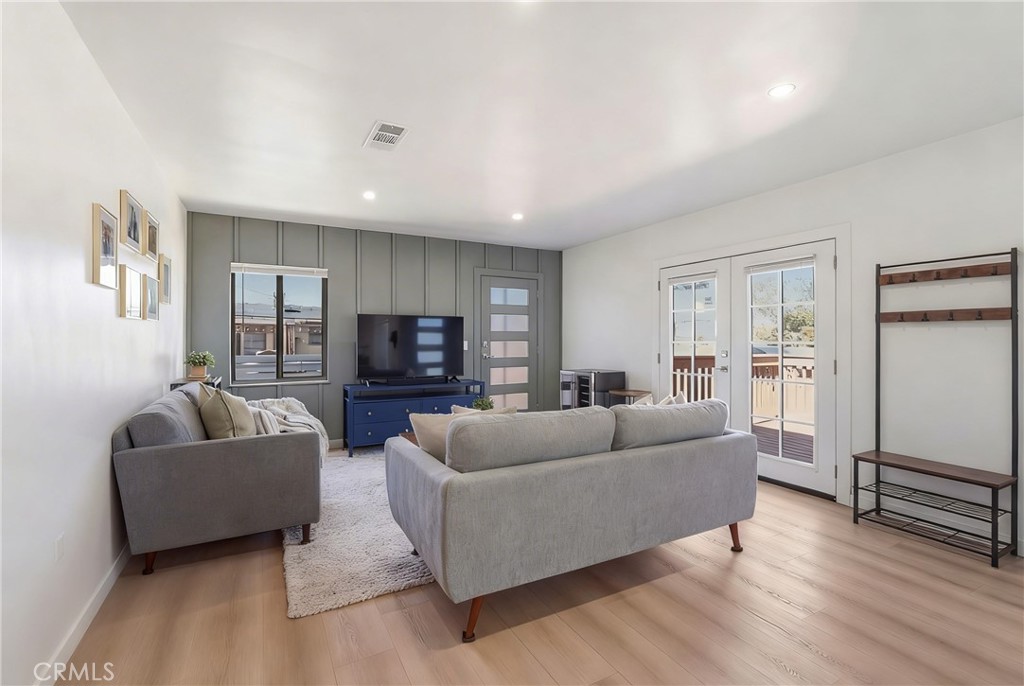 910 Arwin Street Pasadena, CA 91001 - Photo 3 of 23 a living room with furniture and a wooden floor