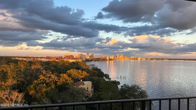 a view of a lake from a balcony