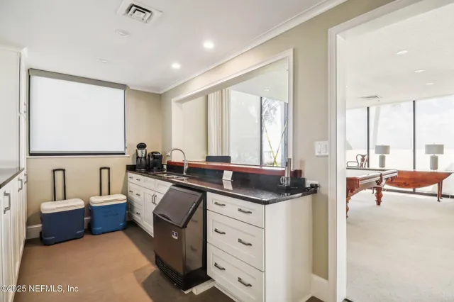 a view of a a dining room with furniture window and outside view