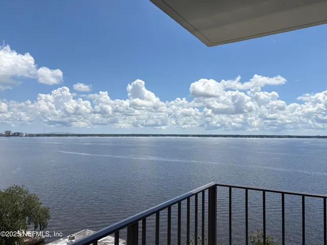 a view of a balcony with an outdoor space