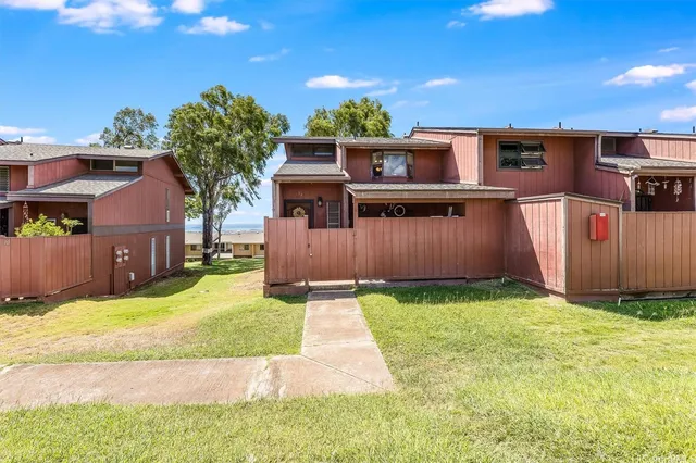 a view of a backyard with a garden